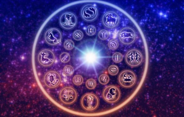 Roda dos signos do Zodíaco em um fundo com tons de roxo, rosa e azul