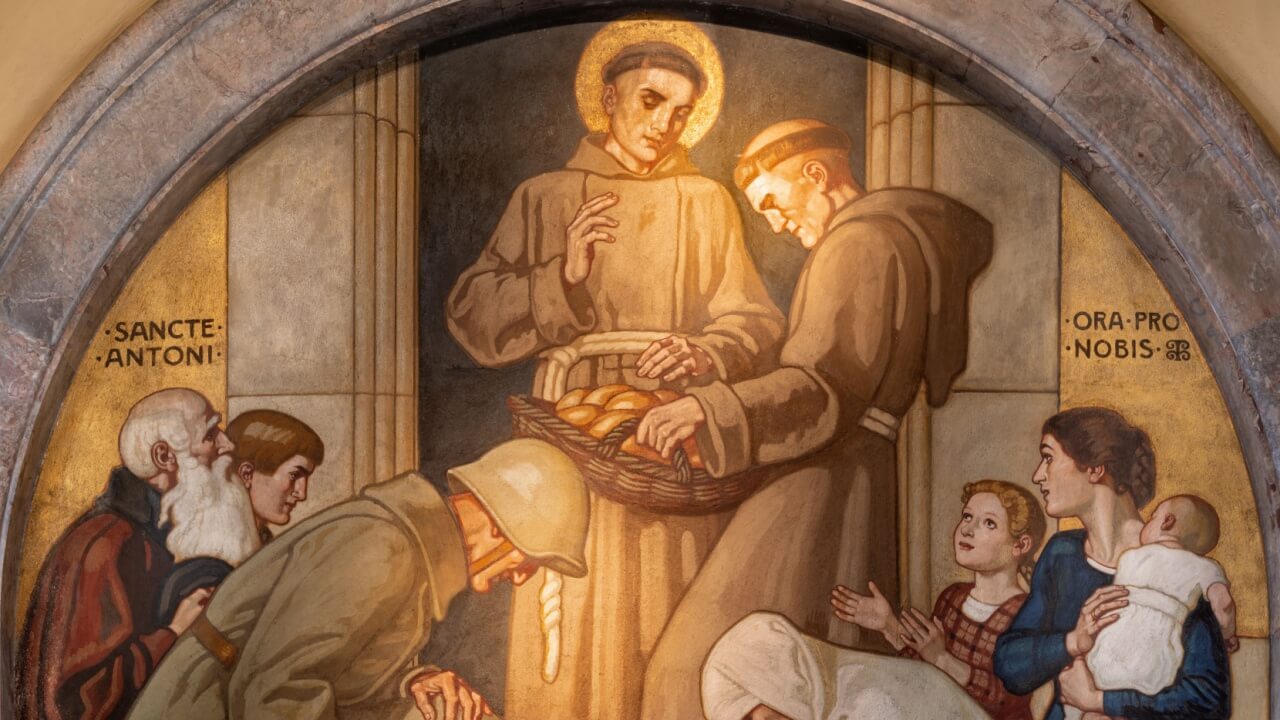 imagem de santo antônio distribuindo pães