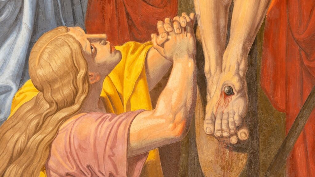 imagem de maria madalena aos pés de Jesus Cristo